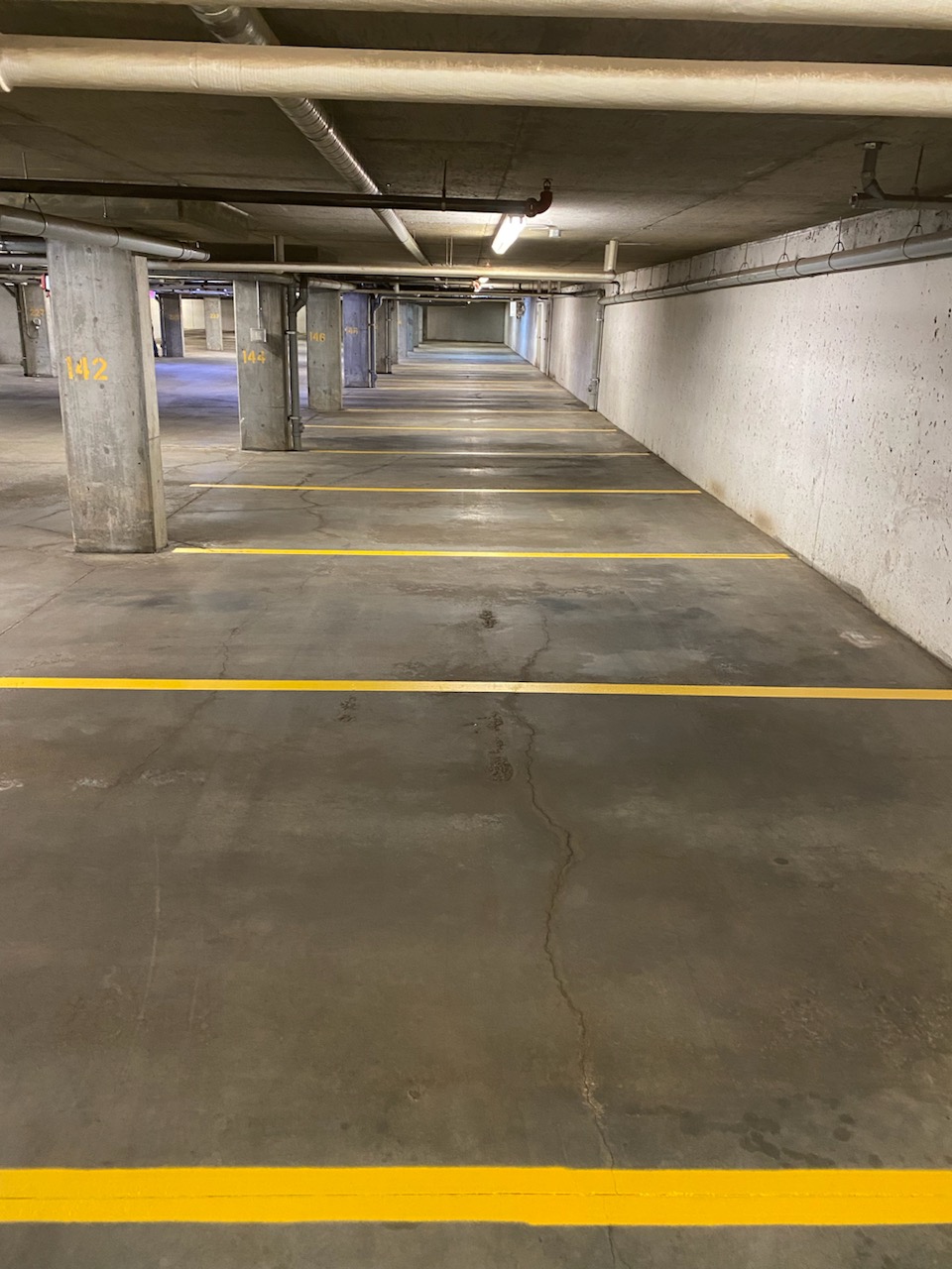 Parking structure with marked parking spaces